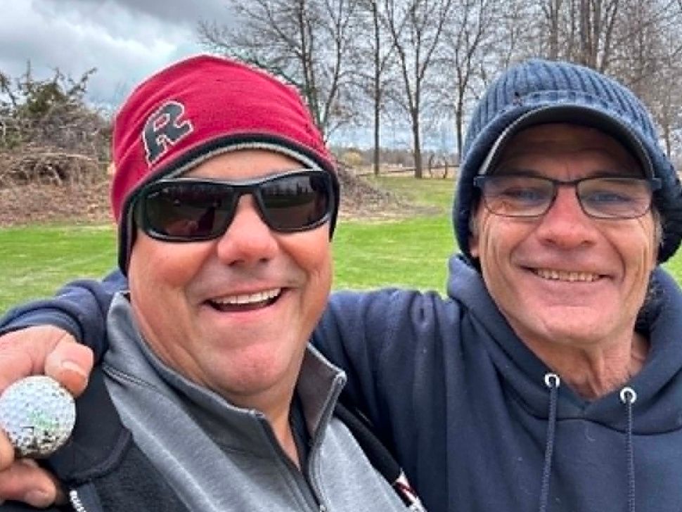 Rob Dupont (left) and friend Erin Bryson pose on the course at the Portage Golf Club with the ball Dupont used to record the club’s first hole-in-one of the season Tuesday morning.